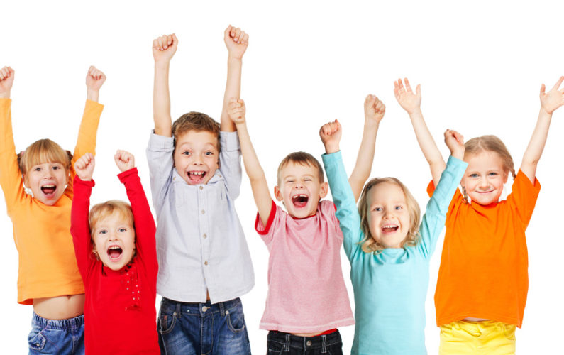 Happiness group children with their hands up isolated on white