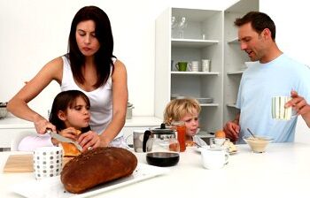 stock-footage-family-having-breakfast-together-in-the-kitchen-at-home