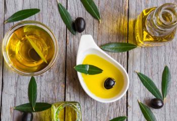 olive_oils_and_olives_on_table